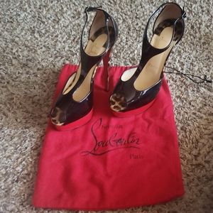 Black and cheeta print Christian Louboutin.